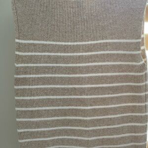 Never worn sleeveless vest with stripes size S